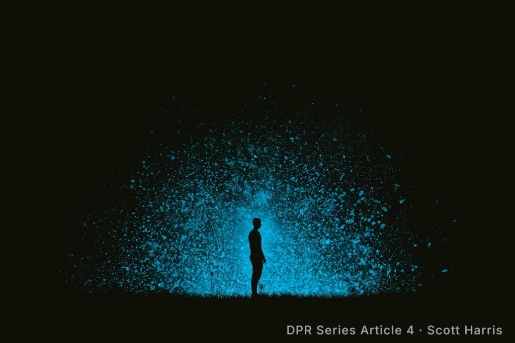 Silhouette of a person standing in a burst of glowing blue particles at night