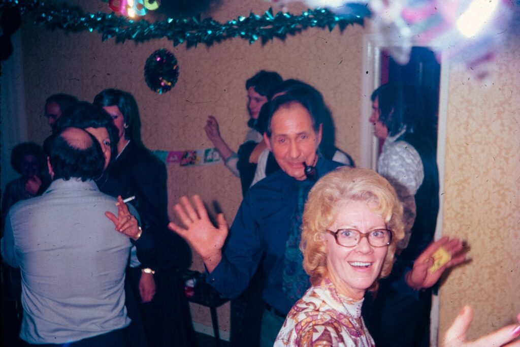 A 1980s family party with a woman laughing